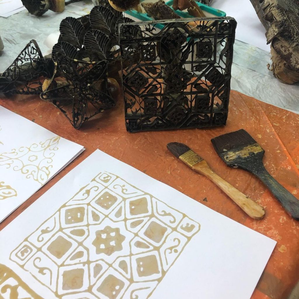 Textile designing in Malaysia.The process of Batik. Photo of paper with wax motif. 